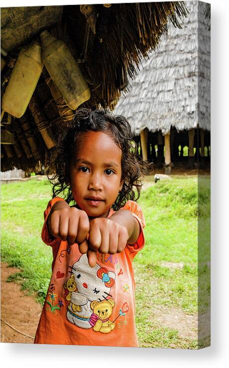 Wae Rebo Canvas Print featuring the photograph Child's Play - Wae Rebo Village. Flores, Indonesia by Earth And Spirit