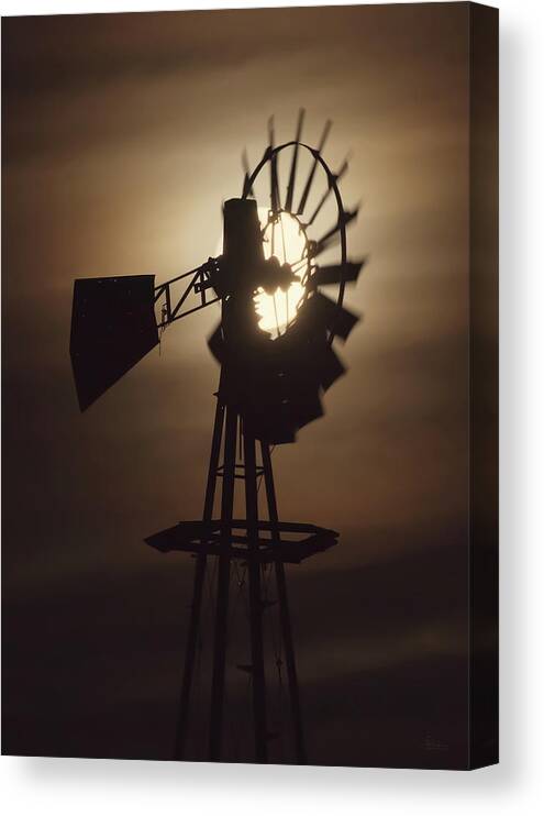 Windmill Canvas Print featuring the photograph Lunar Power - full moon behind a still-turning abandoned ND windmill by Peter Herman