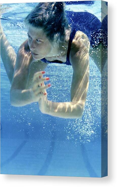 Accessories Canvas Print featuring the photograph Model Underwater With Red Nail Polish by Kourken Pakchanian