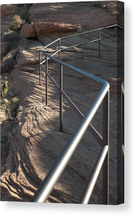 Shadow Canvas Print featuring the photograph Railing on rocks by Fotosearch