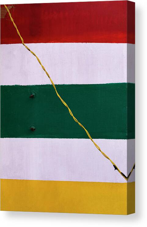 Yellow Electricity Wire Canvas Print featuring the photograph Yellow Wire Vs Striped Background by Prakash Ghai