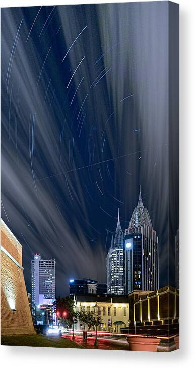 City Canvas Print featuring the photograph Star Trails and City Lights by Brad Boland