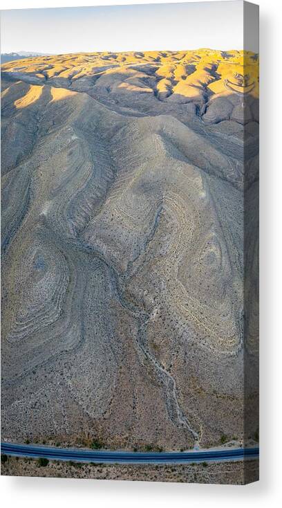 Landscapeaerial Canvas Print featuring the photograph An Aerial View Shows A Rugged Mountain #2 by Ethan Daniels