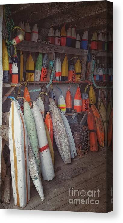 Buoys Canvas Print featuring the photograph Buoys in a sea shack by Mary Capriole