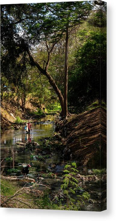 Wading Canvas Print featuring the photograph Wading the Jatibonico river by Micah Offman