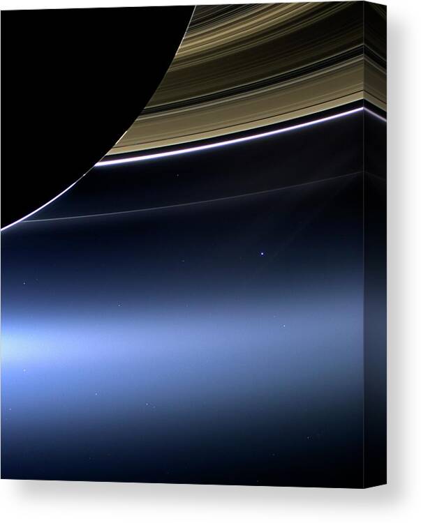 Astronomy Canvas Print featuring the photograph Earth And Moon From Saturn by Nasa
