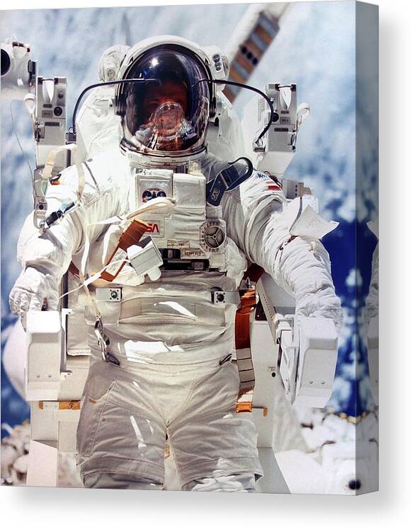 20th Century Canvas Print featuring the photograph Astronaut During Space-walk by Detlev Van Ravenswaay