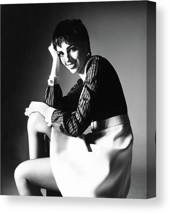 Actress Canvas Print featuring the photograph Liza Minnelli Wearing A Gino Charles Dress by Bert Stern