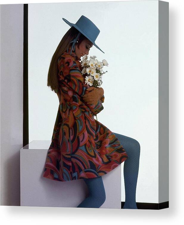Fashion Canvas Print featuring the photograph Marisa Berenson Wearing A Printed Coat by Gianni Penati