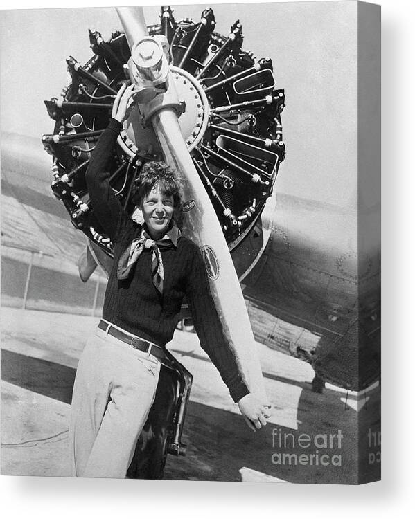 People Canvas Print featuring the photograph Amelia Earhart Posing Before Her Planes by Bettmann