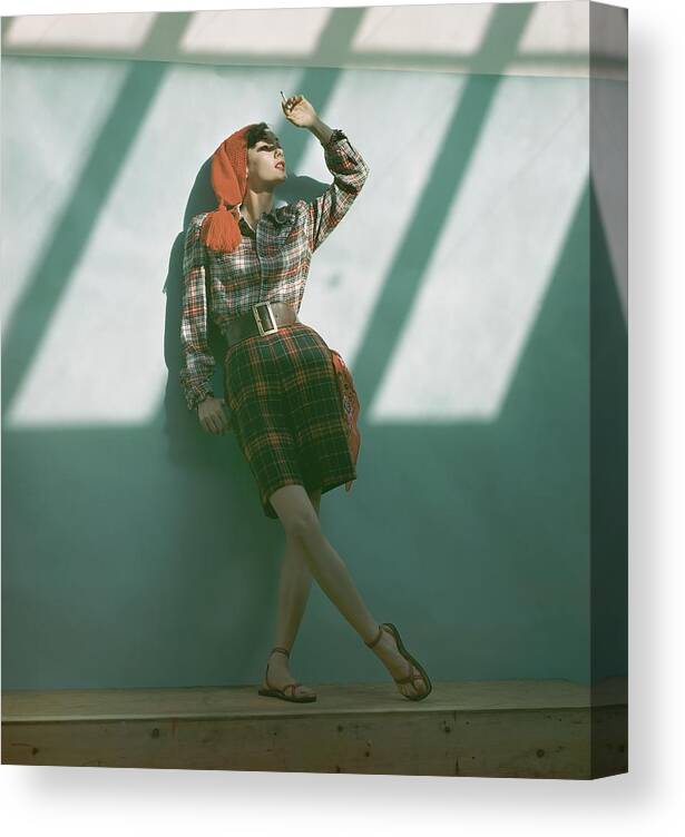 #new2022 Canvas Print featuring the photograph Model With Cigarette Beneath Skylights by John Rawlings
