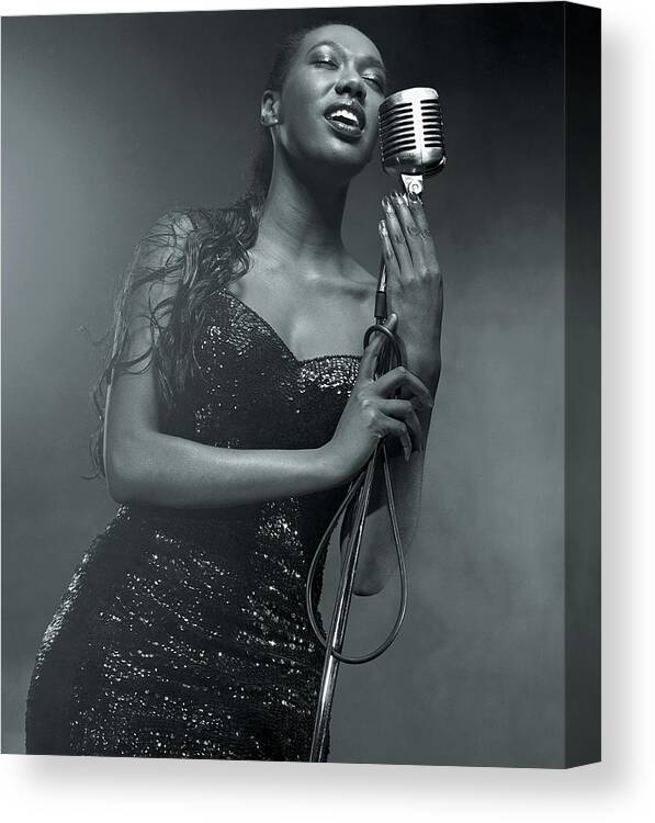 Singer Canvas Print featuring the photograph Sexy Singer With Microphone by Digital Vision.