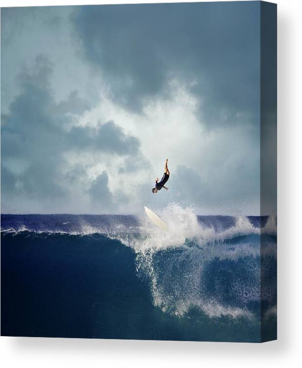 Spray Canvas Print featuring the photograph Surfer Falling Off Surfboard Into by Ed Freeman