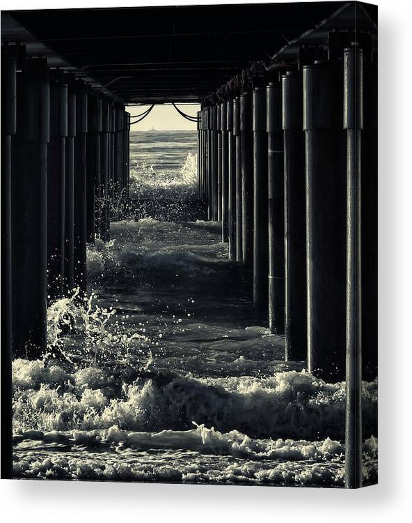 Pier Canvas Print featuring the photograph Under The Pier by Marco Bianchetti