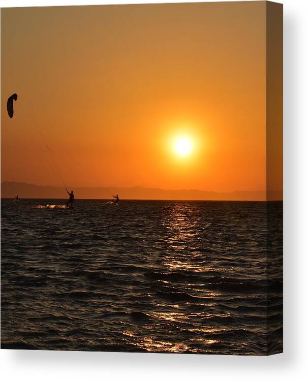 Kitesurfing Canvas Print featuring the photograph Red sea sunset by Luca Lautenschlaeger
