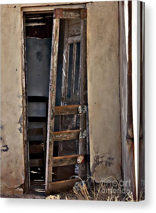 Weathered Exterior Canvas Print featuring the photograph Cuervo Frontdoor by Lee Craig