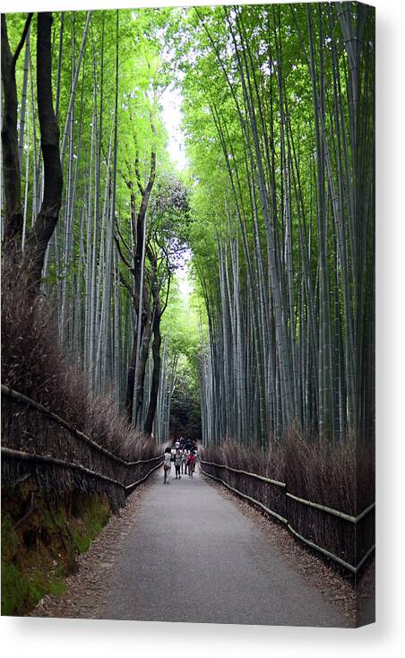 Arashiyama Canvas Print featuring the photograph Arashiyama Bamboo Path by Nano Calvo