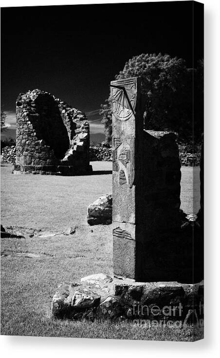 Nendrum Canvas Print featuring the photograph Remains Of The 6th Century Round Tower And Reconstructed Sundial Nendrum County Down Ireland by Joe Fox