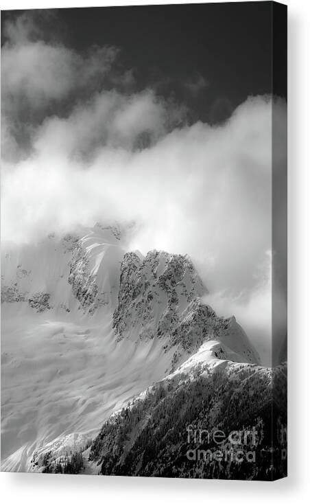 Mountains Canvas Print featuring the photograph Into the mist by David Hillier