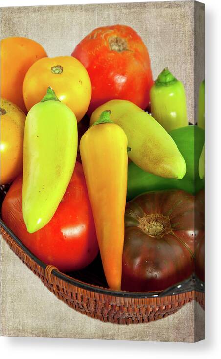Tomatoes Canvas Print featuring the photograph Tomatoes Peppers in a Basket by Dan Carmichael