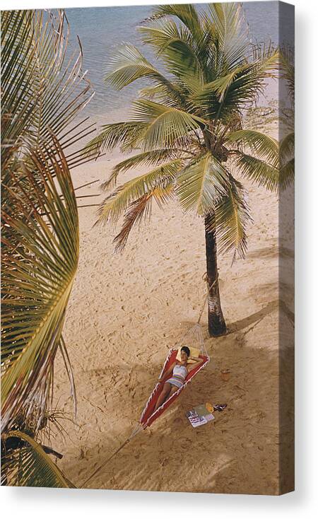 Summer Canvas Print featuring the photograph Caribe Hilton Beach by Slim Aarons