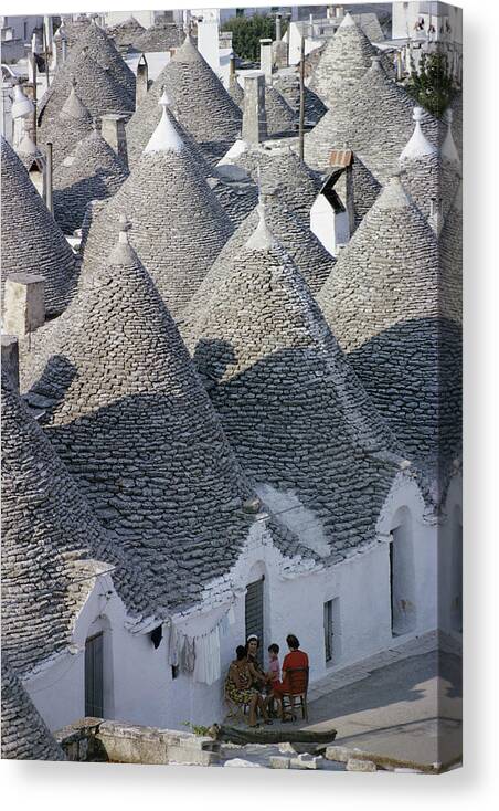 Row House Canvas Print featuring the photograph Alberobello by Slim Aarons