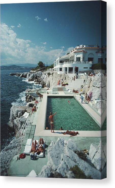 Summer Canvas Print featuring the photograph Eden-roc Pool by Slim Aarons