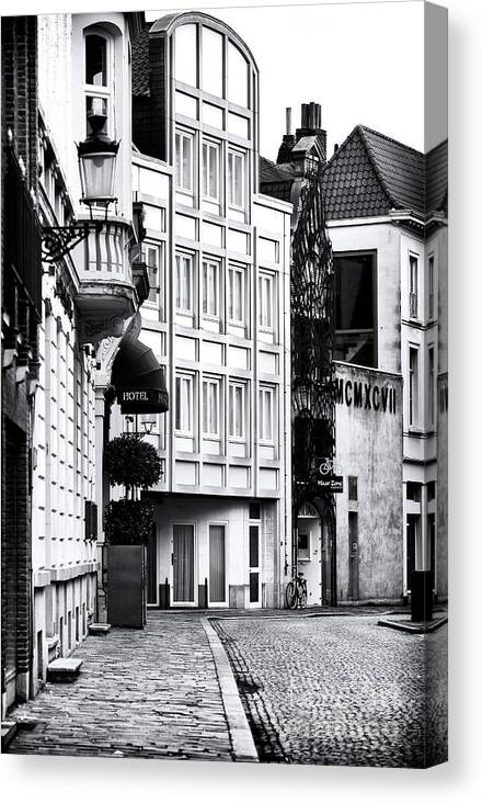 Bruges Where The Road Leads Canvas Print featuring the photograph Bruges Where the Road Leads by John Rizzuto