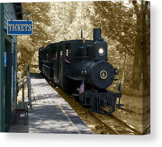A Train Is Arriving At The Station Canvas Print featuring the photograph A Train is Arriving at the Station by Daniel Hebard