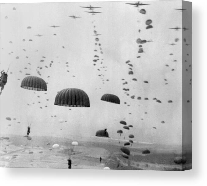 History Canvas Print featuring the photograph Allied Aircraft Drop Paratroopers by Everett