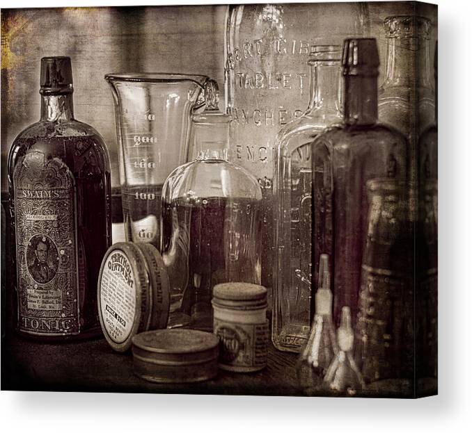 Antique Canvas Print featuring the photograph Bottles and Tins by Wayne Meyer