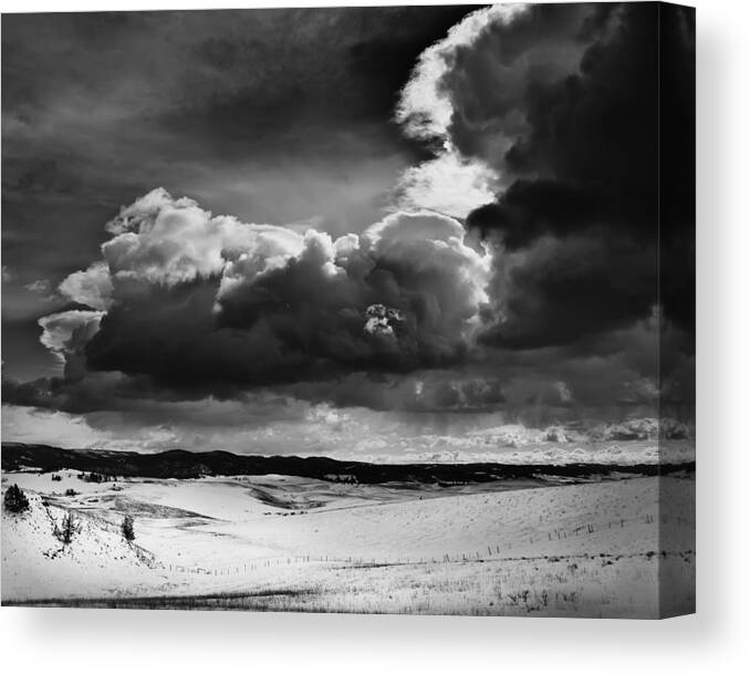 Clouds Canvas Print featuring the photograph Dark Clouds Over Snowy Landscape by Theresa Tahara