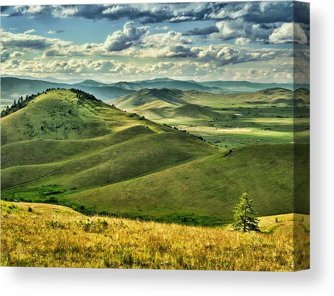 Clouds Canvas Print featuring the photograph Hills of the National Bison Range in Montana by Donna Caplinger