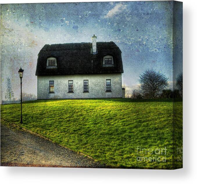 Accommodation Canvas Print featuring the photograph Irish Thatched Roofed Home by Juli Scalzi