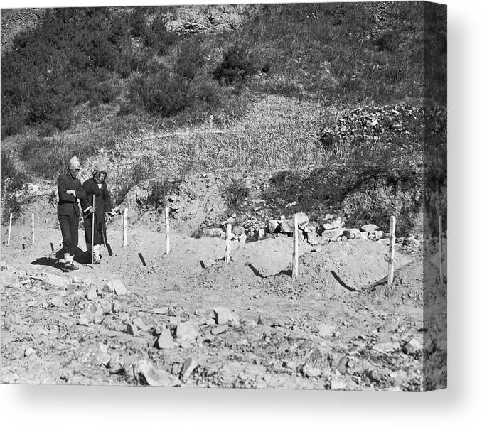1940's Canvas Print featuring the photograph North Korean Massecre Graves by Underwood Archives
