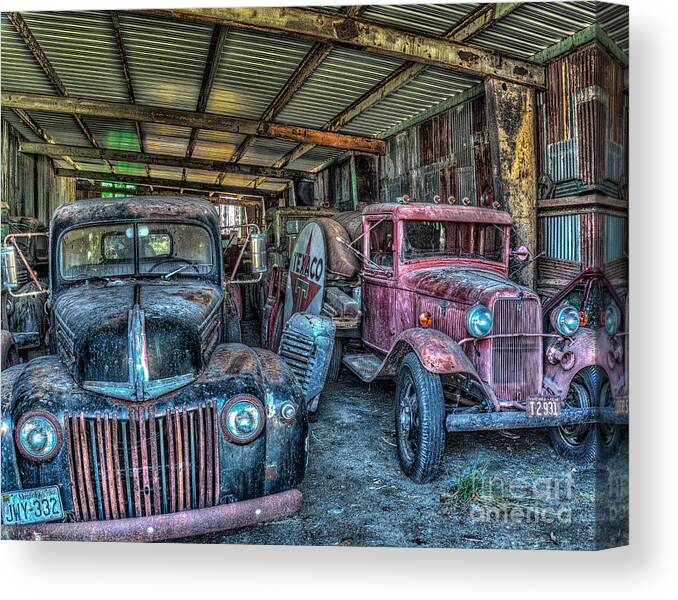 Old Canvas Print featuring the photograph Old Truck Barn by Izet Kapetanovic