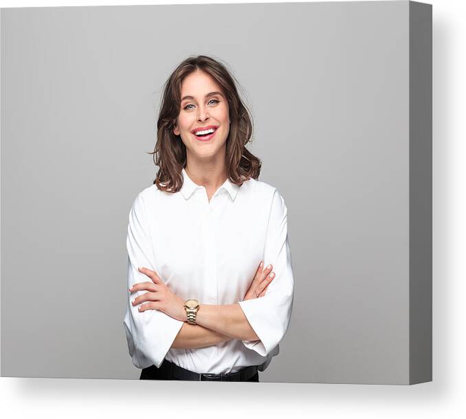 People Canvas Print featuring the photograph Portrait of beautiful young businesswoman by Izusek
