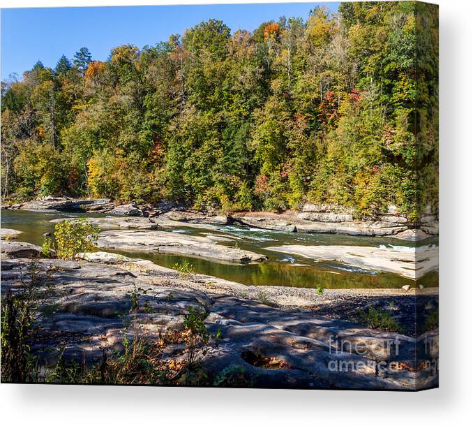 Landscape Canvas Print featuring the photograph Rock and Water by Ken Frischkorn