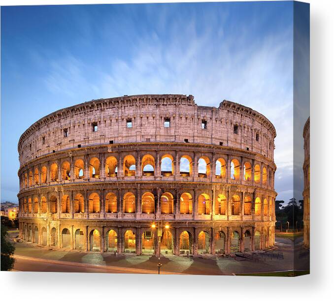 Arch Canvas Print featuring the photograph The Golden Colosseum At Dusk In Rome by Romaoslo