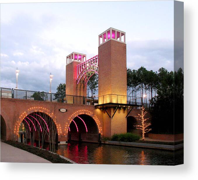 Arches Canvas Print featuring the photograph Winter Evening Lights on The Woodlands USA Waterway by Connie Fox