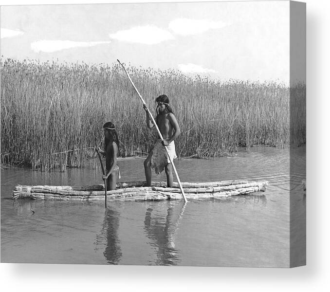 1920s Canvas Print featuring the photograph Yokuts Poling Tule Boats by Underwood Archives Onia