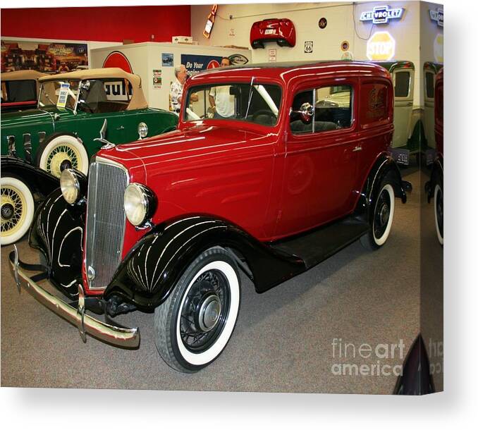 Antique Canvas Print featuring the photograph 1930's Antique Chevrolet Sedan by John Black