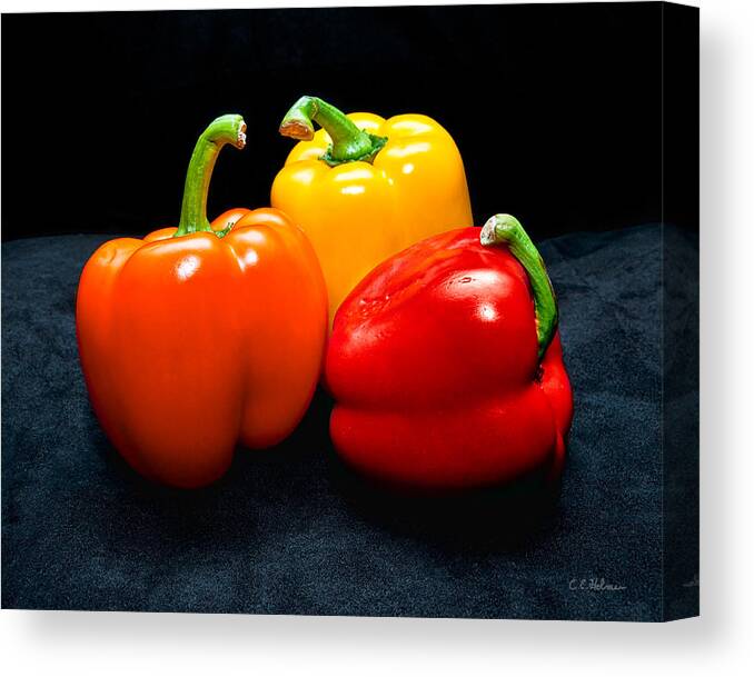 Vegetable Canvas Print featuring the photograph The Three Peppers by Christopher Holmes
