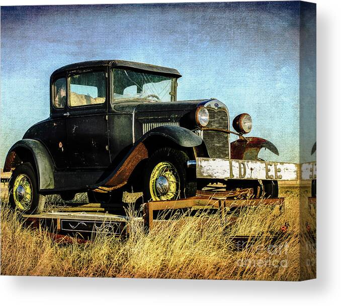 Rusty Cars Canvas Print featuring the photograph 1931 Ford Model A by John Strong