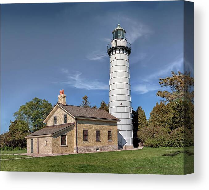 Lighthouses Canvas Print featuring the photograph Cana Island Lighthouse by Susan Rissi Tregoning