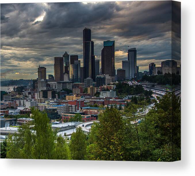 Clouds Canvas Print featuring the photograph Downtown by Jerry Cahill