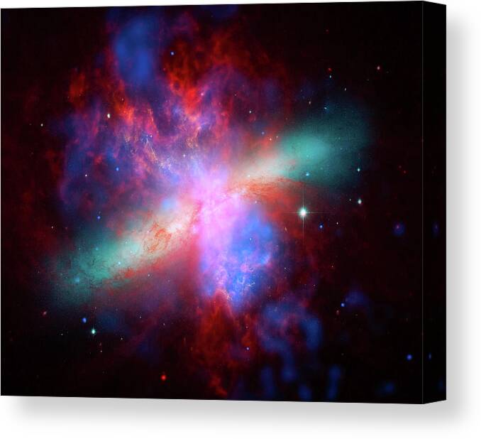 Carl Sagan Canvas Print featuring the photograph Galaxy M82 by Marco Oliveira