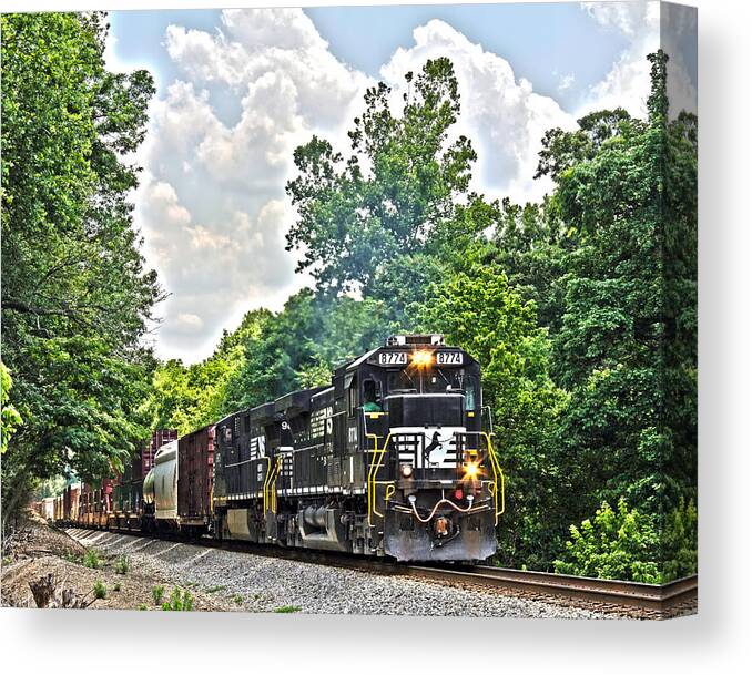 Train Canvas Print featuring the photograph Hauling Freight by Alan Raasch