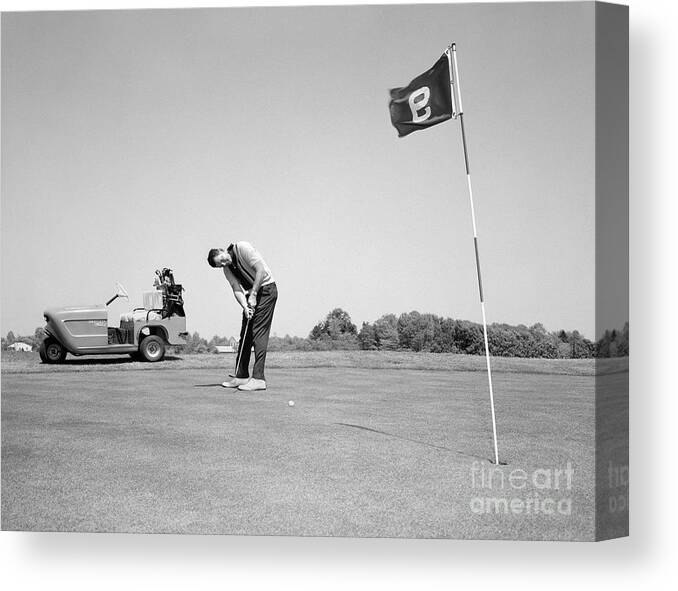 1960s Canvas Print featuring the photograph Man Golfing, C.1960s by H. Armstrong Roberts/ClassicStock
