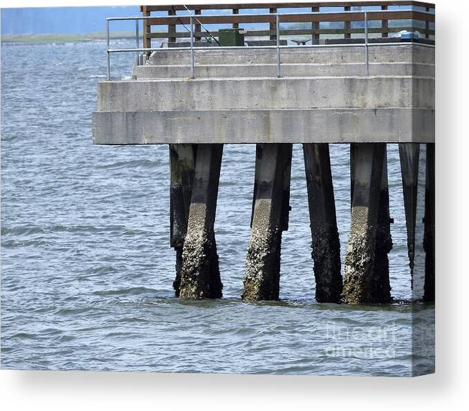 Pier Canvas Print featuring the photograph Pier At Low Tide by Jan Gelders